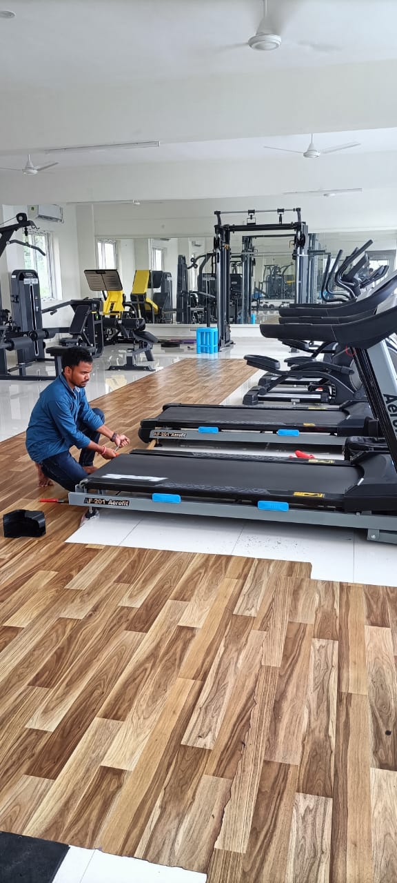 Treadmills installed on wood-finish flooring